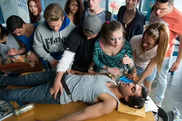 Students gather around a classmate in a scene from "Fack ju Göhte".