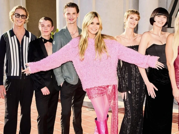 Group photo of Germany's Next Topmodel 2025 participants outdoors.