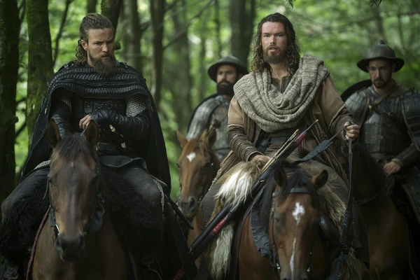 Warriors on horses in "Vikings: Valhalla", dressed in medieval attire, ready for adventure.